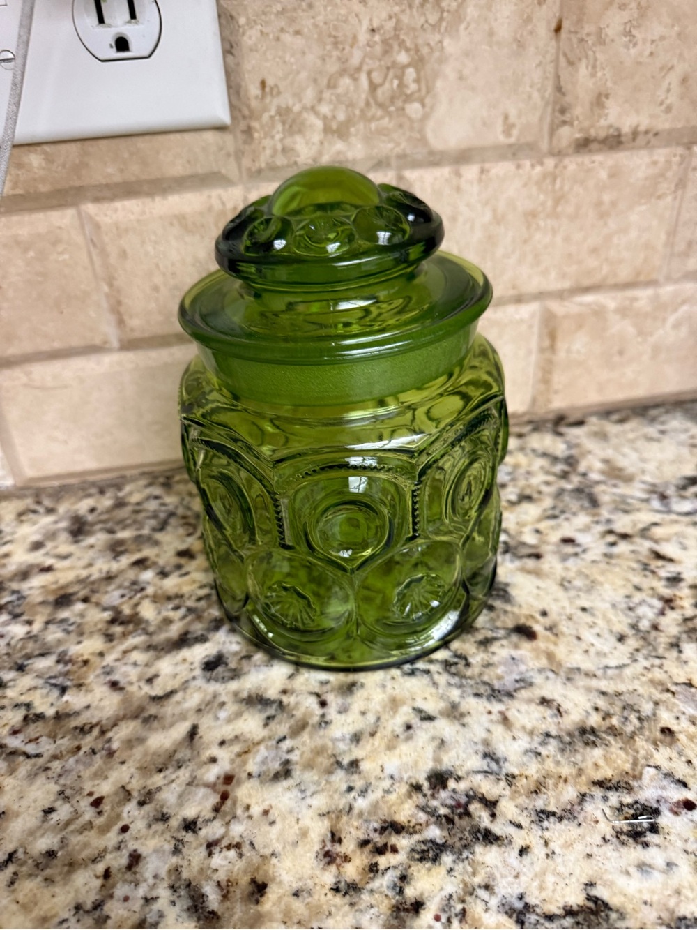 Green Glass Canister with Decorative Bubble Pattern